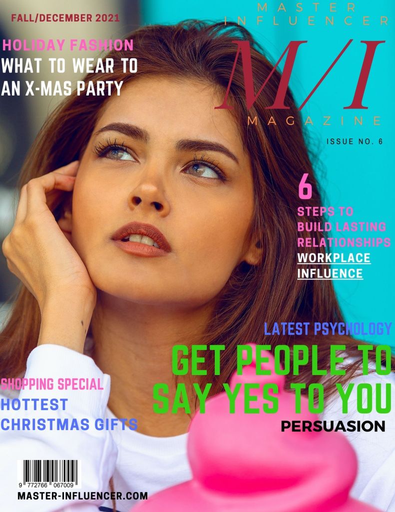 Cover page of Fall/December 2021 Issue featuring a girl with brown hair, brown eyes and red lipstick smiling and looking upwards.